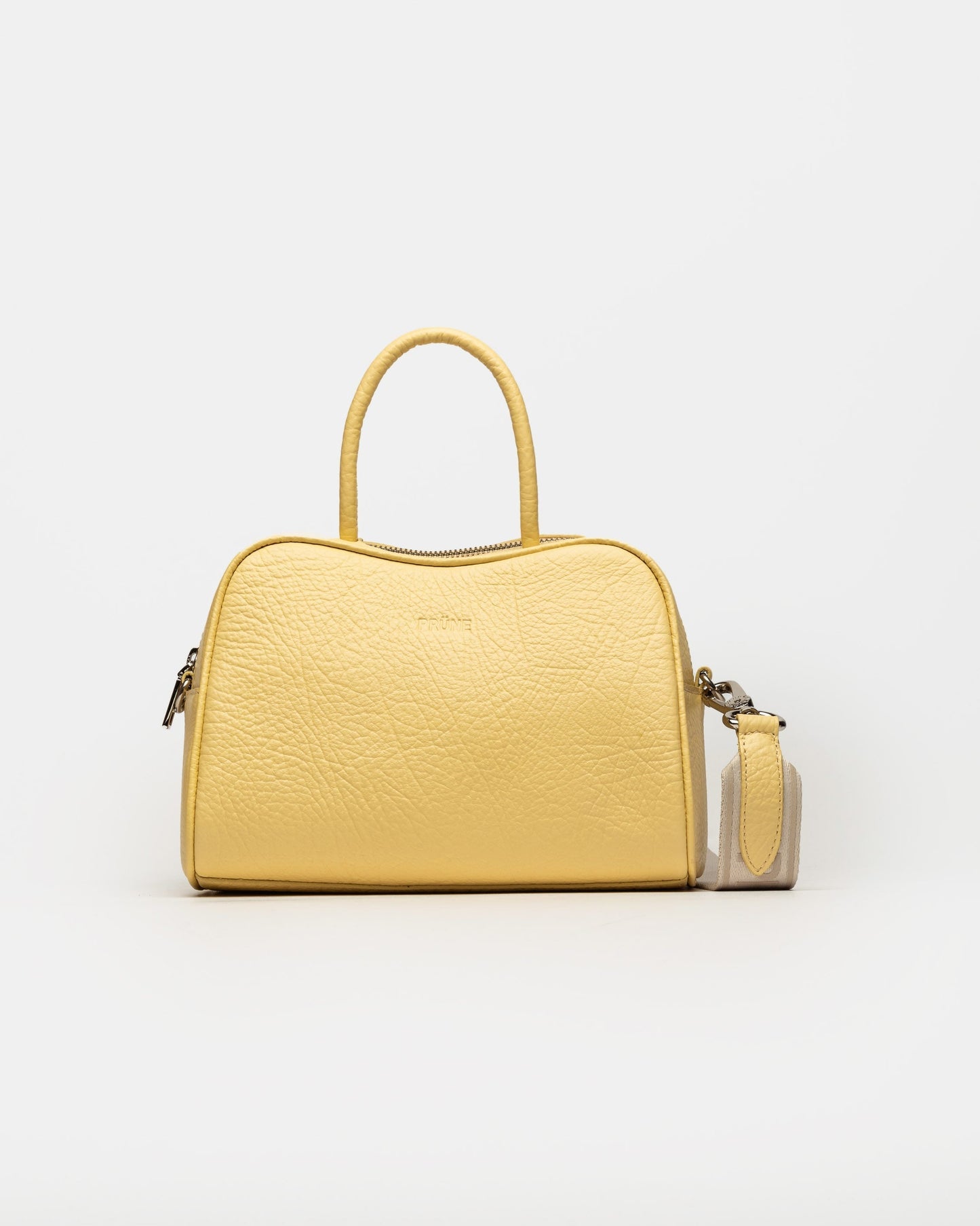 CARTERA DE MANO THE CLUB EN CUERO GRANEADO